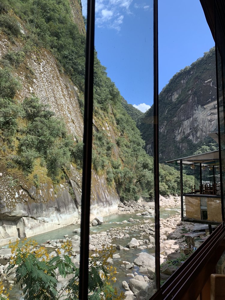 water river view in aguas caliente near machu picchu; solo female travel; solo backpacking; backpacking south america; backpacking tips; peru itinerary;