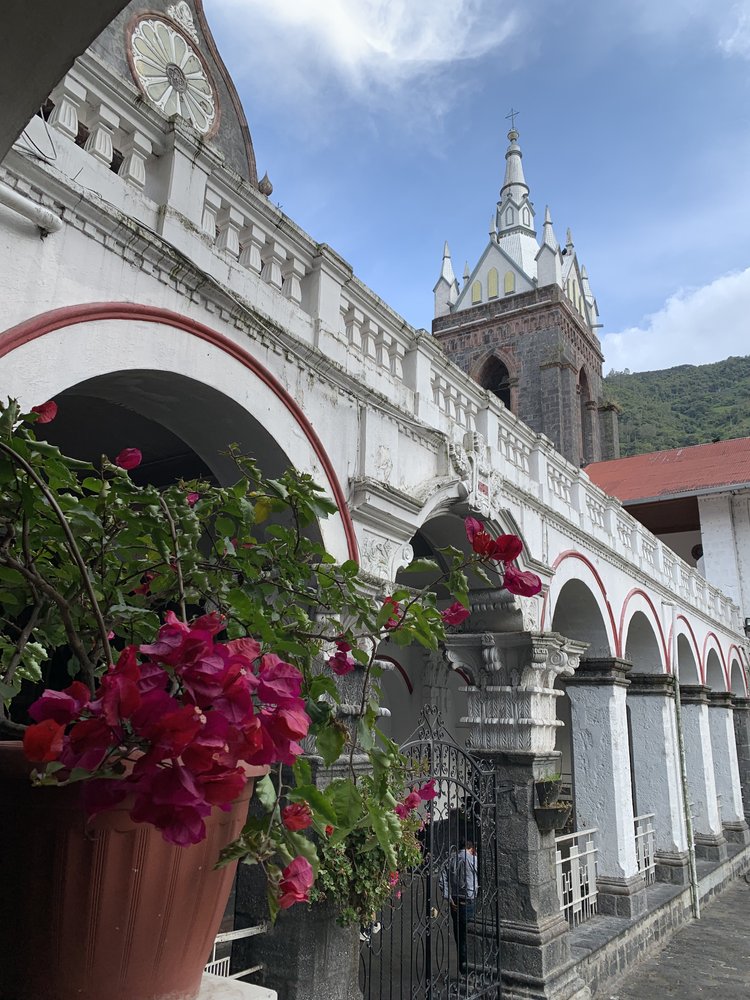 plaza in banos ecuador, south america; hostel bunkbed views in quito ecuador; solo female travel; solo backpacking; backpacking south america; backpacking tips; peru itinerary;