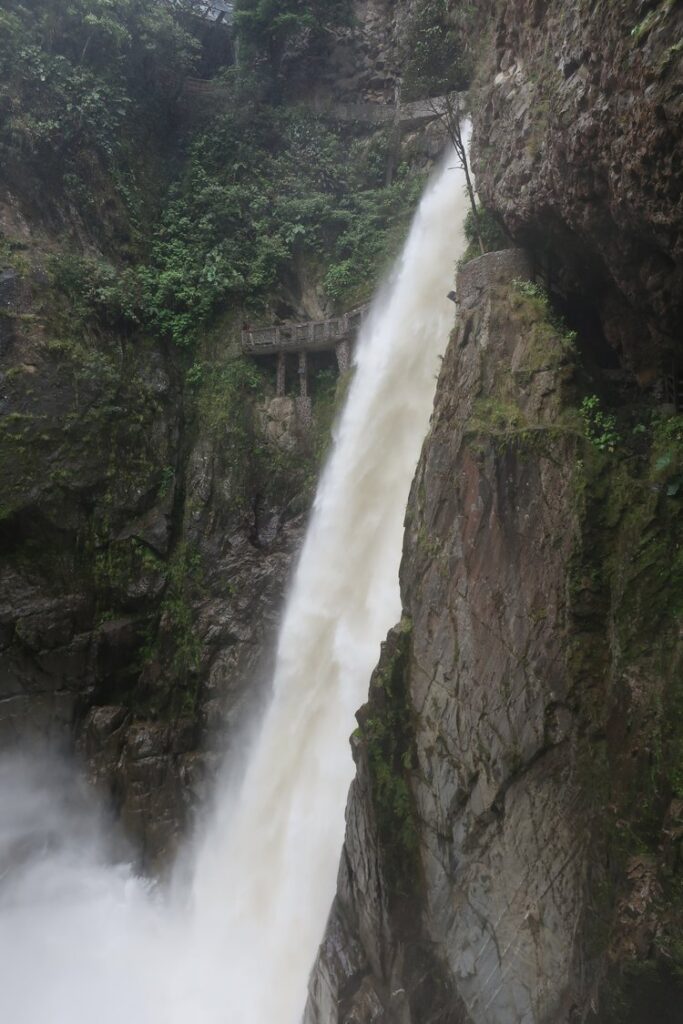 cascada el pailon del diablo in banos ecuador, south america; banos waterfall ecuador; hostel bunkbed views in quito ecuador; solo female travel; solo backpacking; backpacking south america; backpacking tips; peru itinerary;