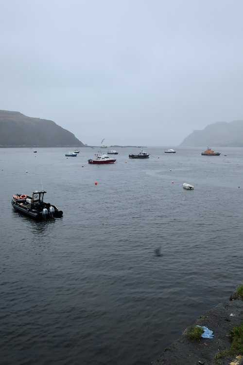 boats on portree harbour on the isle of skye, scotland, uk, europe; solo travel; solo female travel; roadtrip scotland; roadtrip europe; scotland itinerary