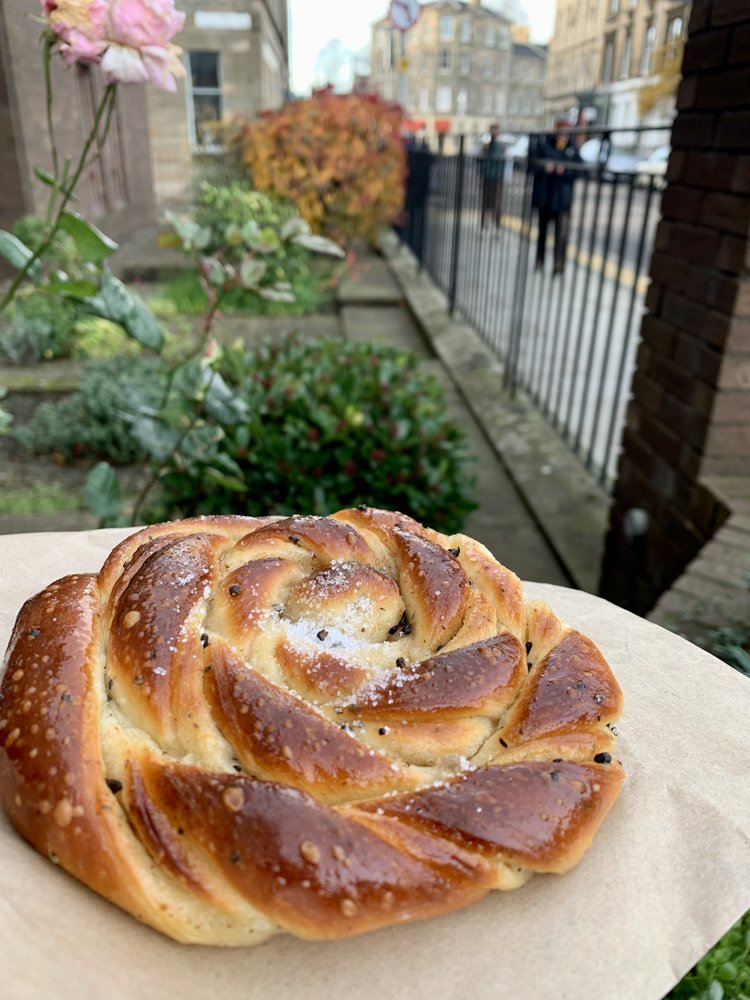 cardamom bun from lannan bakery in stockbridge neighborhood in edinburgh, scotland, uk, europe; solo travel; solo female travel; roadtrip scotland; roadtrip europe; scotland itinerary