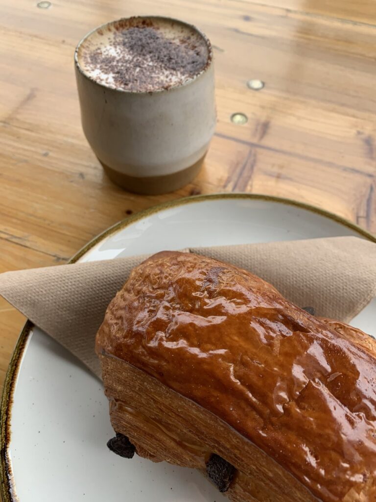 chocolate crossaint, pain au chocolat and mocha from hobs bakery in edinburgh scotland, uk, europe; solo travel; solo female travel; roadtrip scotland; roadtrip europe; scotland itinerary