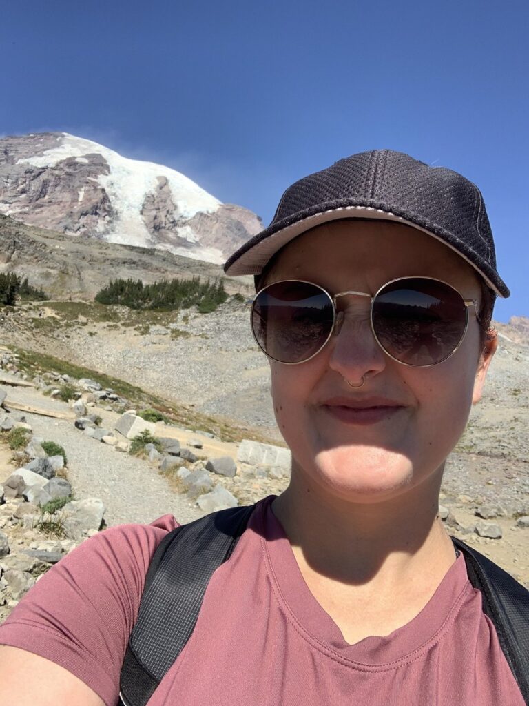 woman hiking in mount rainier national park in washington state, usa, north america; female hikers; solo travel; solo female travel; roadtrip usa