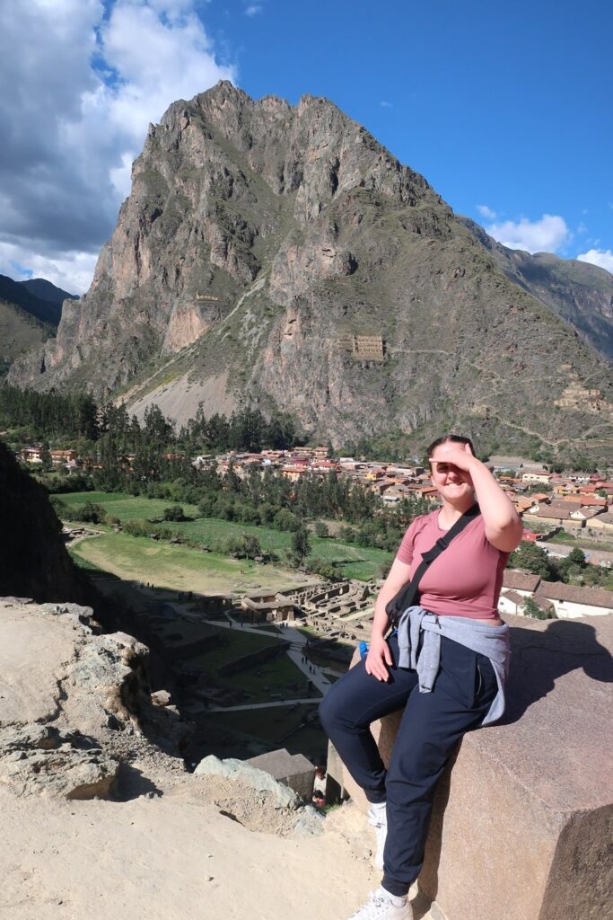 woman sitting in the sacred valley in peru, south america; solo female travel; solo backpacking; backpacking south america; backpacking tips; peru itinerary;