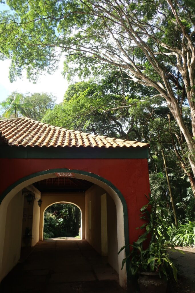 red building in tijuca rainforest in Rio de Janeiro, Brazil; backpacking south america; solo backpacking trip; female backpacking trip tips; solo travel tips; solo female travel; brazil travel itinerary