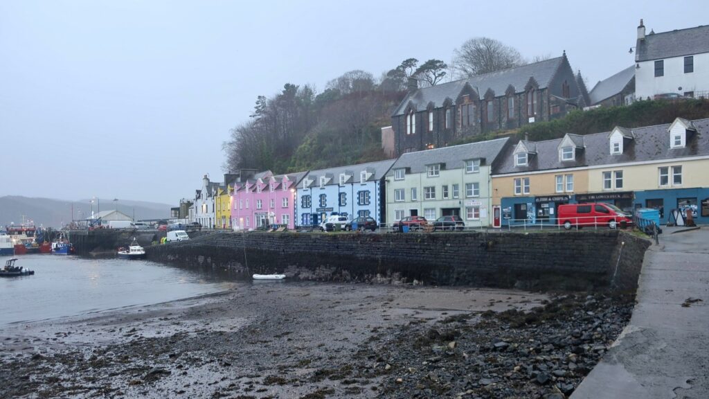 colorful portree harbour on isle of skye, scotland, uk, europe; solo travel; solo female travel; roadtrip scotland; roadtrip europe; scotland itinerary