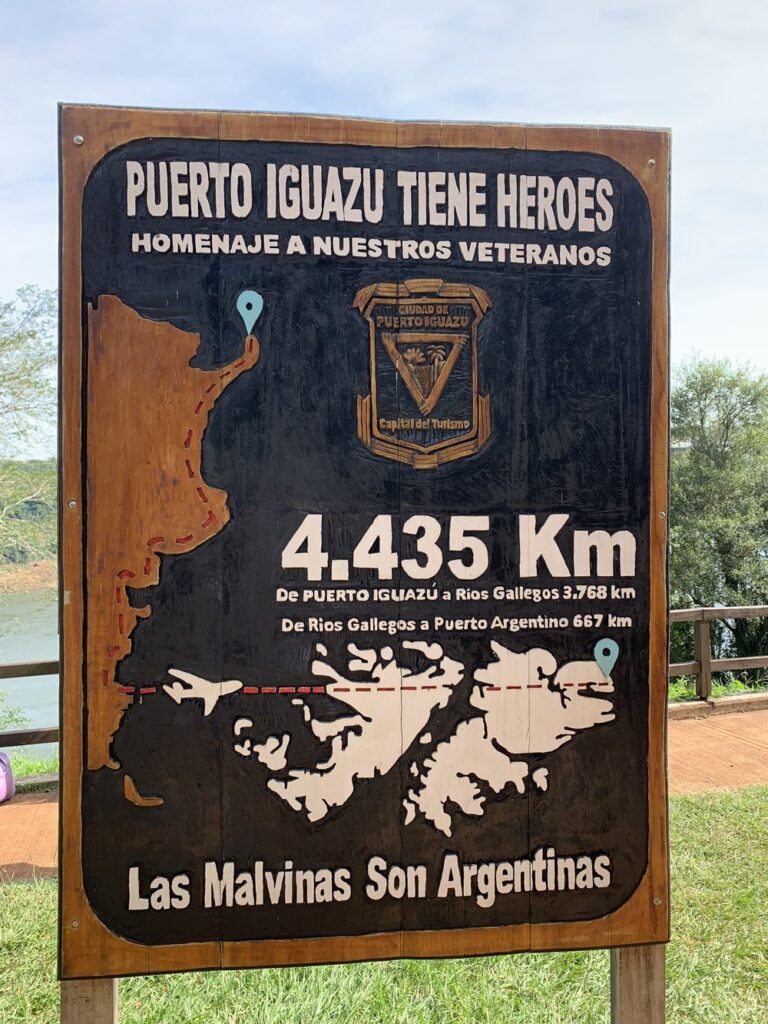 puerto iguazu tiene heroes sign in puerto iguazu argentina; backpacking south america; solo backpacking trip; female backpacking trip tips; solo travel tips; solo female travel; argentina travel itinerary