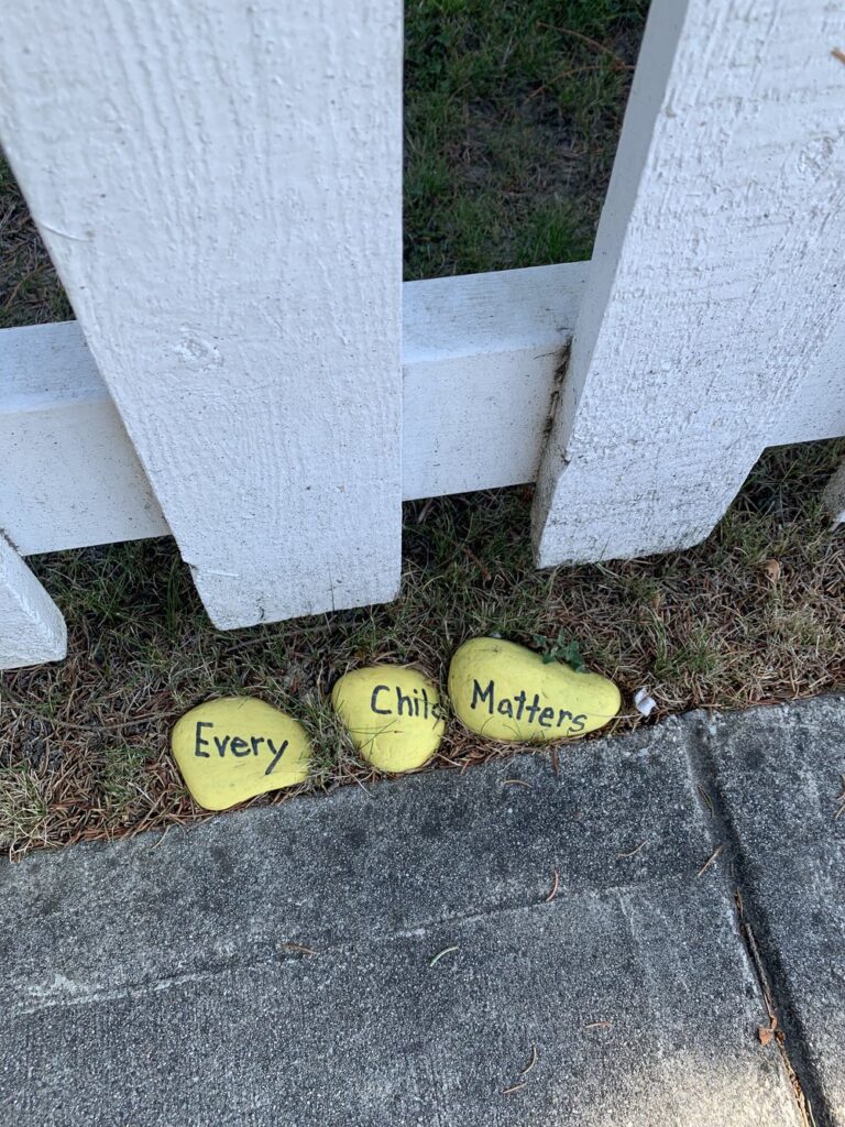 every child matters written on yellow rocks in vancouver, canada; motivational quotes; motivational sign; positive sign; positive affirmation