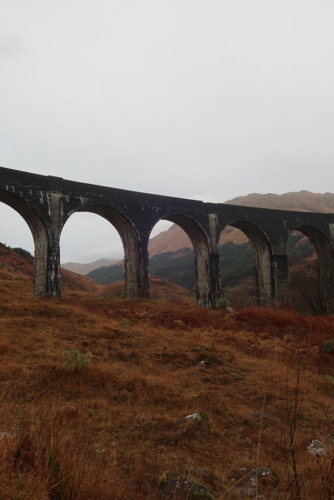 glenfinnan viaduct in scotland, united kingdom, europe; harry potter movies; solo travel; solo female travel; roadtrip scotland; roadtrip europe; scotland itinerary