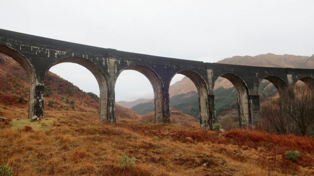 glenfinnan viaduct in scotland, united kingdom, europe; harry potter movies; solo travel; solo female travel; roadtrip scotland; roadtrip europe; scotland itinerary