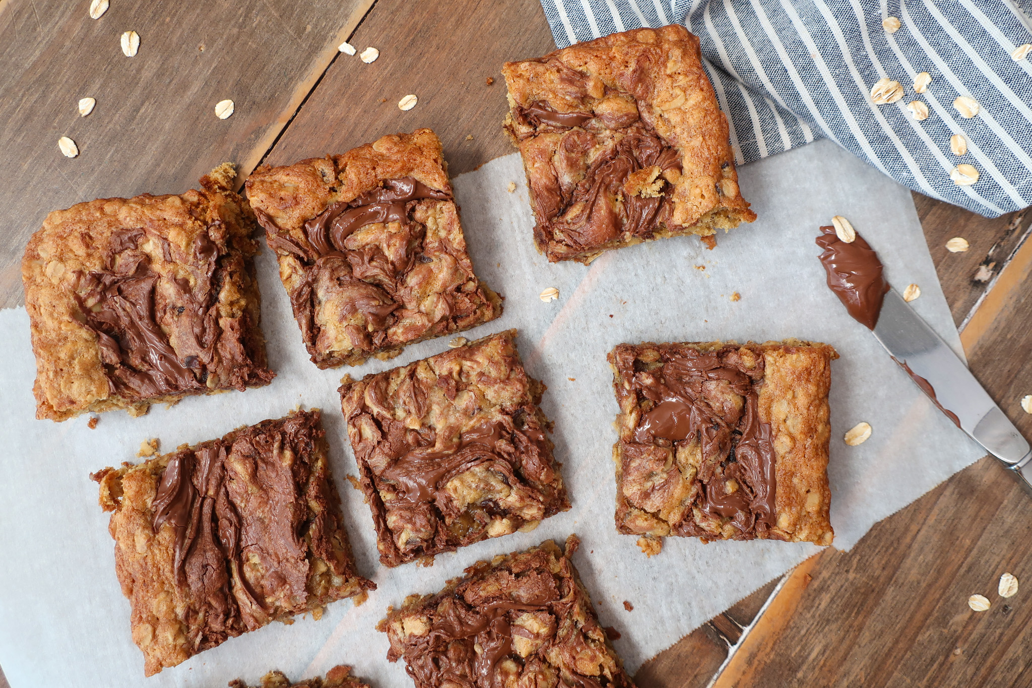 Nutella date oatmeal bars with swirls of Nutella on top