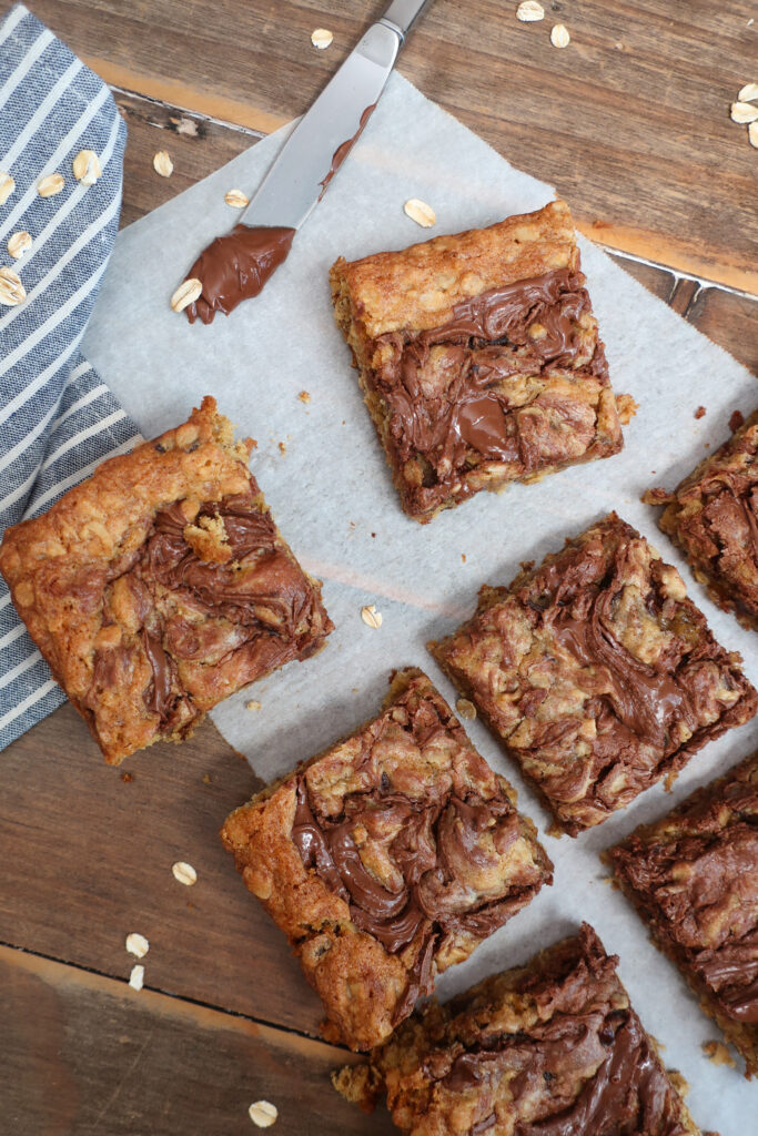 Nutella date oatmeal bars with swirls of Nutella on top