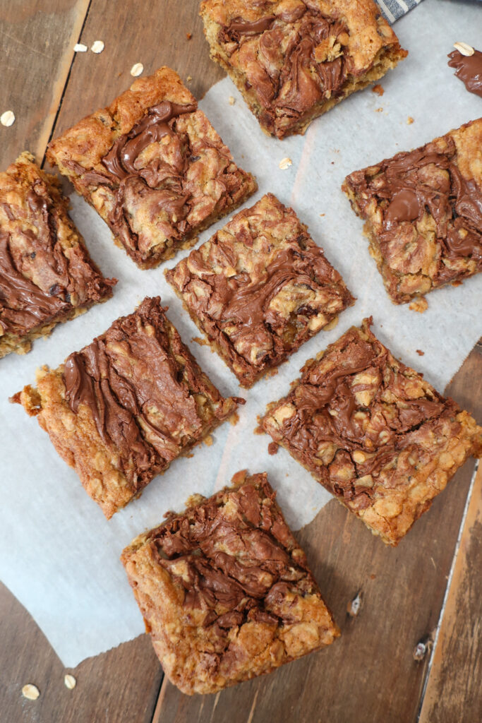 Nutella date oatmeal bars with swirls of Nutella on top