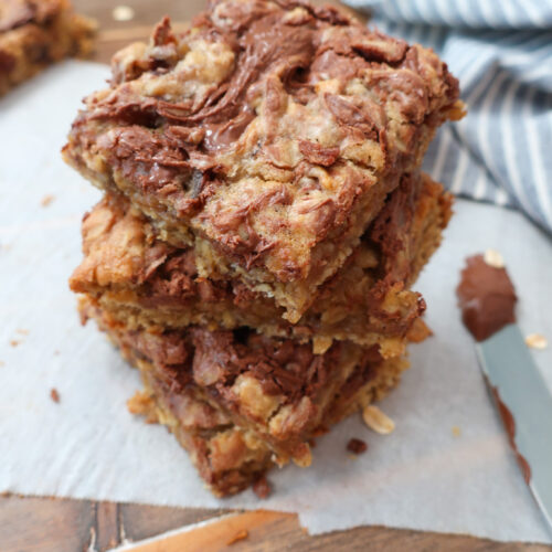 Nutella date oatmeal bars with swirls of Nutella on top