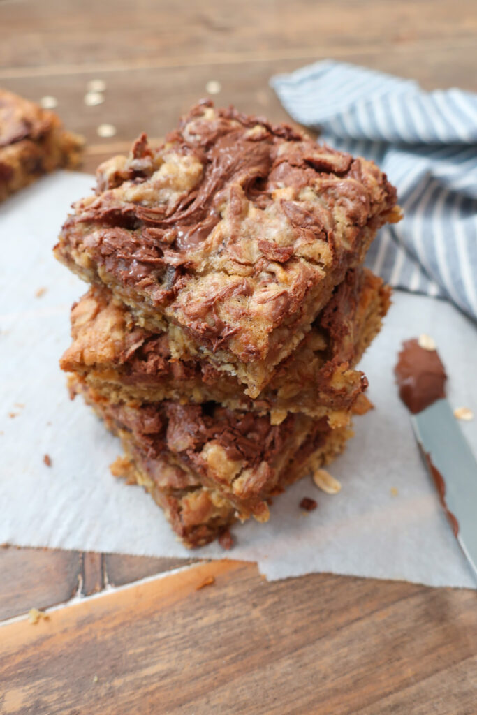 Nutella date oatmeal bars with swirls of Nutella on top