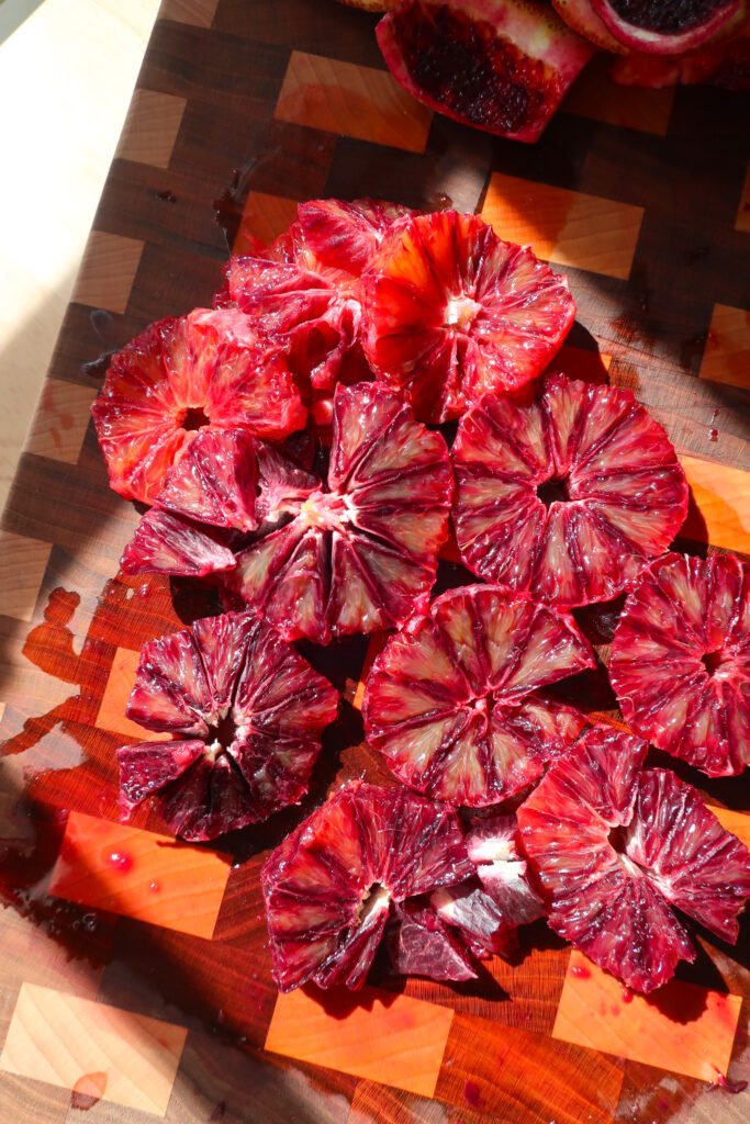 sliced fresh blood oranges, fresh blood oranges for blood orange galette drizzled with homemade salted caramel