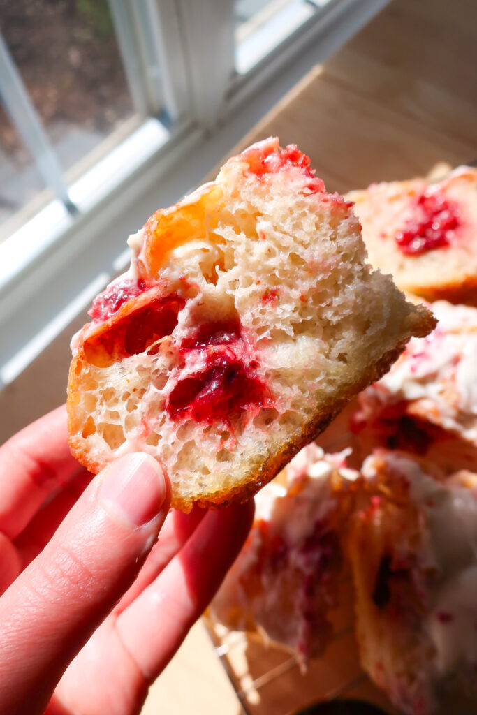 strawberry jam filling focaccia holes covered in cream cheese glaze, no-knead focaccia, one focaccia two flavors, strawberry cheesecake focaccia