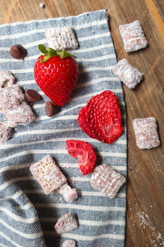 up close fresh strawberries and chocolate with puppy chow