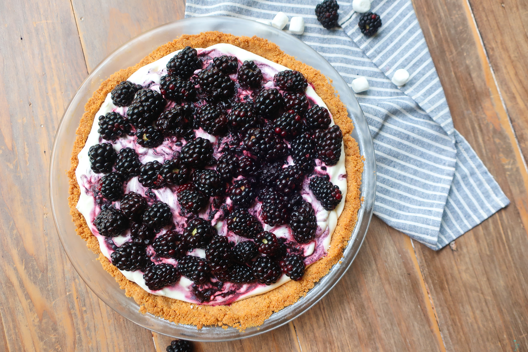 homemade easy blackberry pie with marshmallow whipped cream