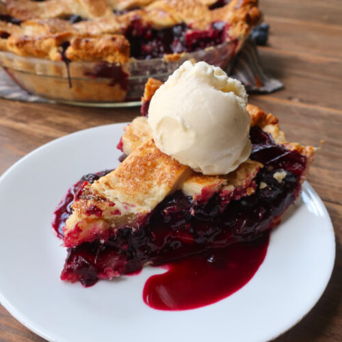 homemade blueberry pie with vanilla ice cream