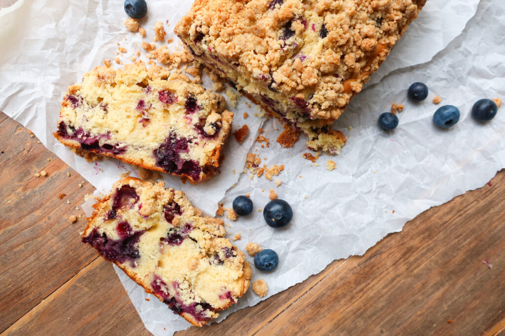 slices blueberry muffin loaf with crumble