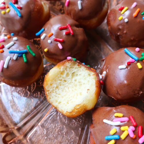 homemade donut holes with chocolate cream soda glaze