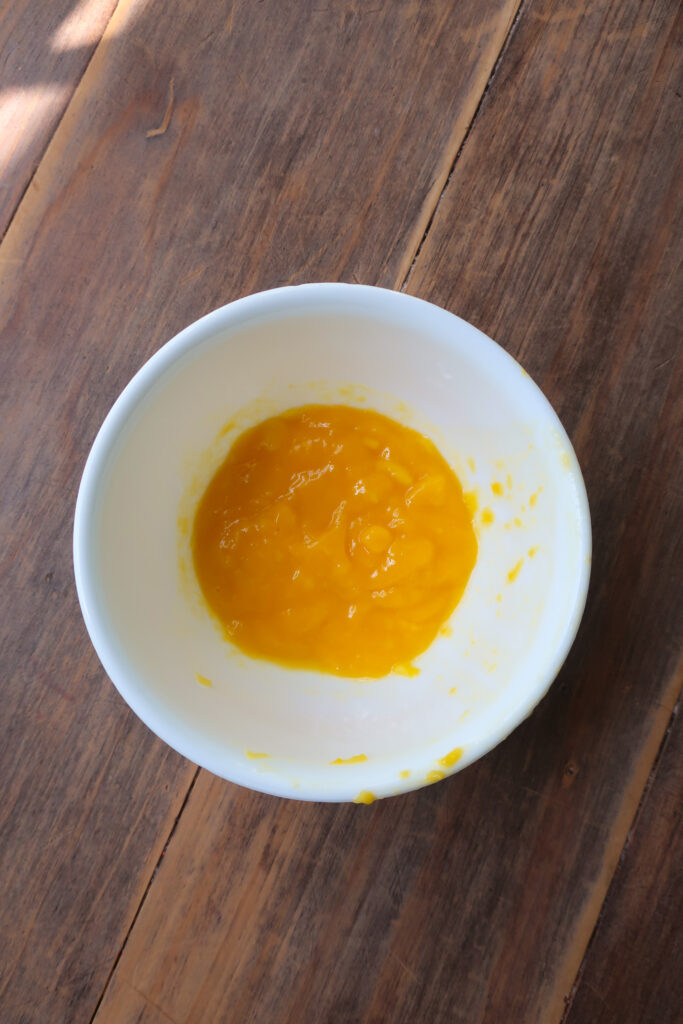 mango puree in white bowl