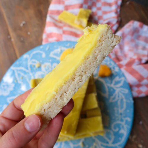 inside coconut shortbread bar with mango glaze