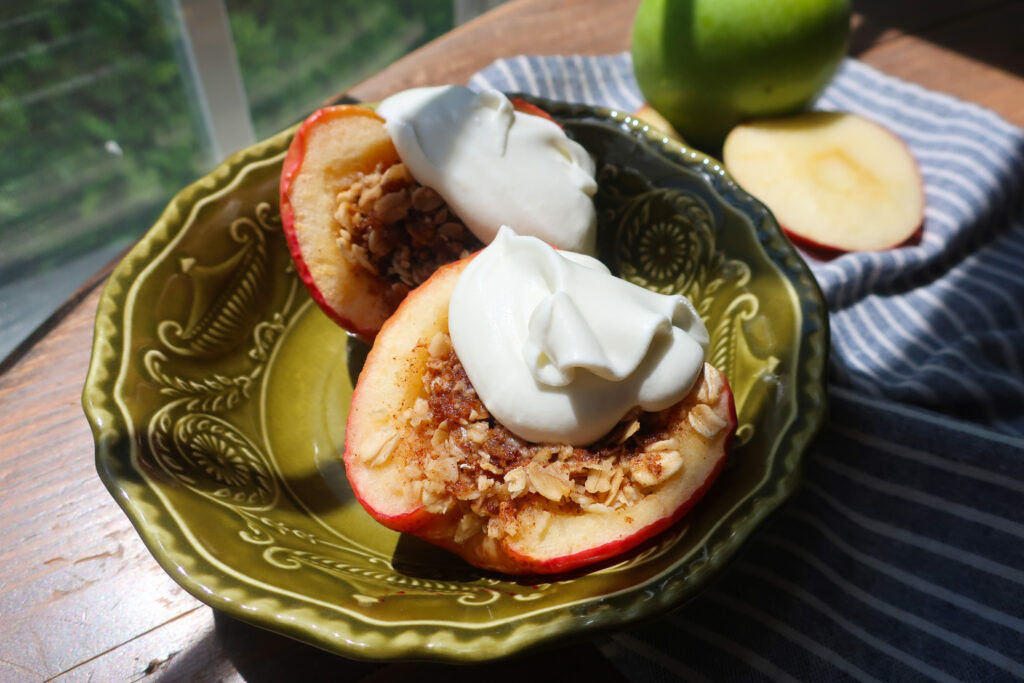 baked apple topped with fresh whipped cream