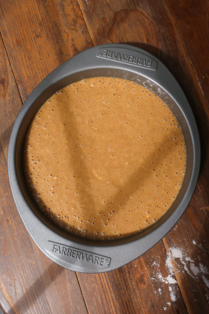 batter for cinnamon olive oil cake in pan