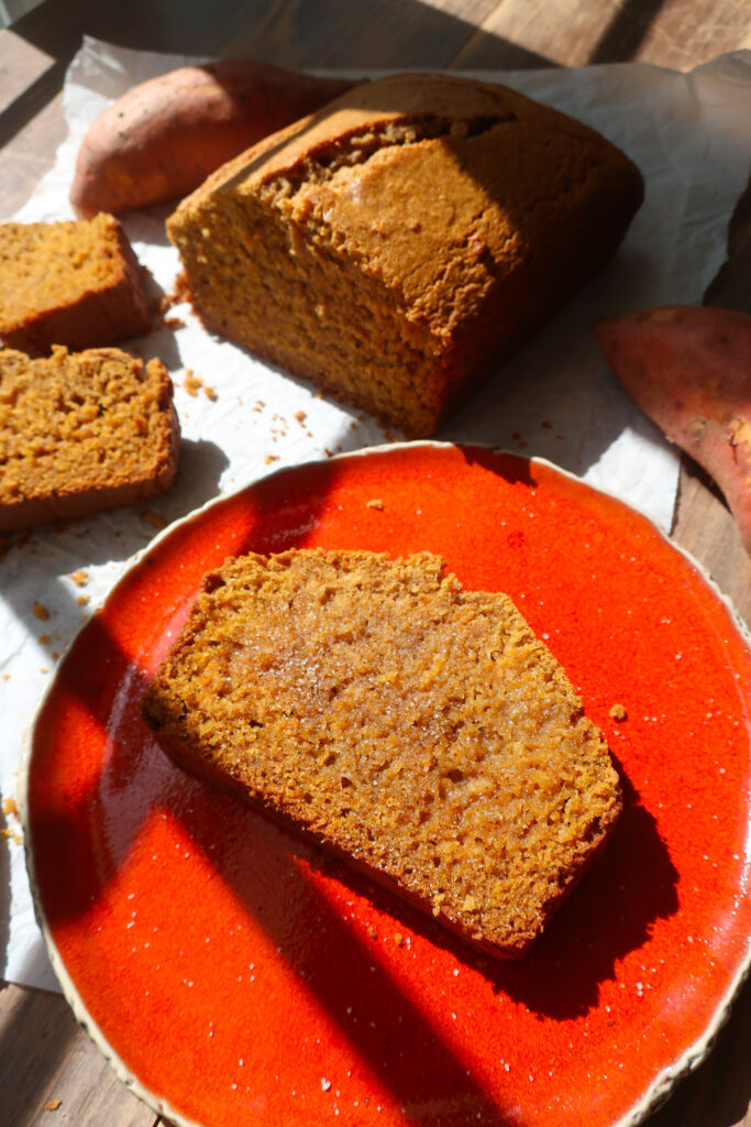 sliced sweet potato bread on red-orange plate