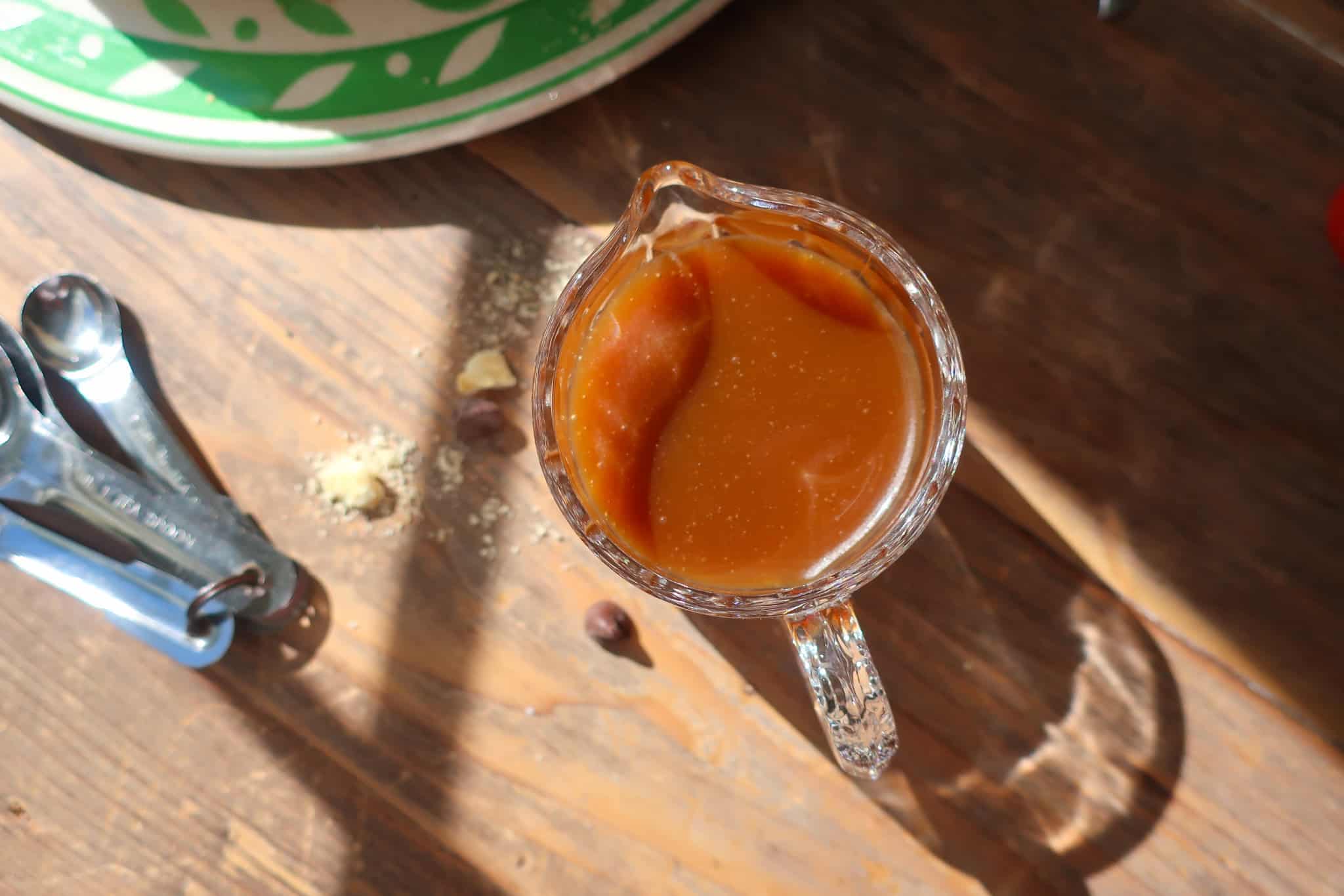 toffee sauce in small glass pitcher