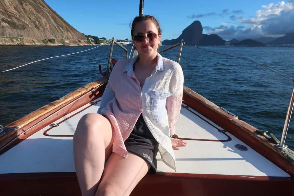Solo traveling female on boat in Guanabara Bay in Brazil