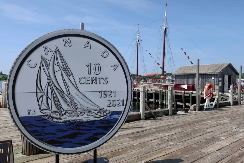 large sign featuring canadian currency in lunenburg nova scotia