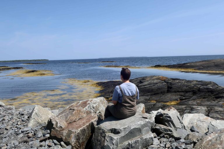 woman exploring 5 best things to do in nova scotia