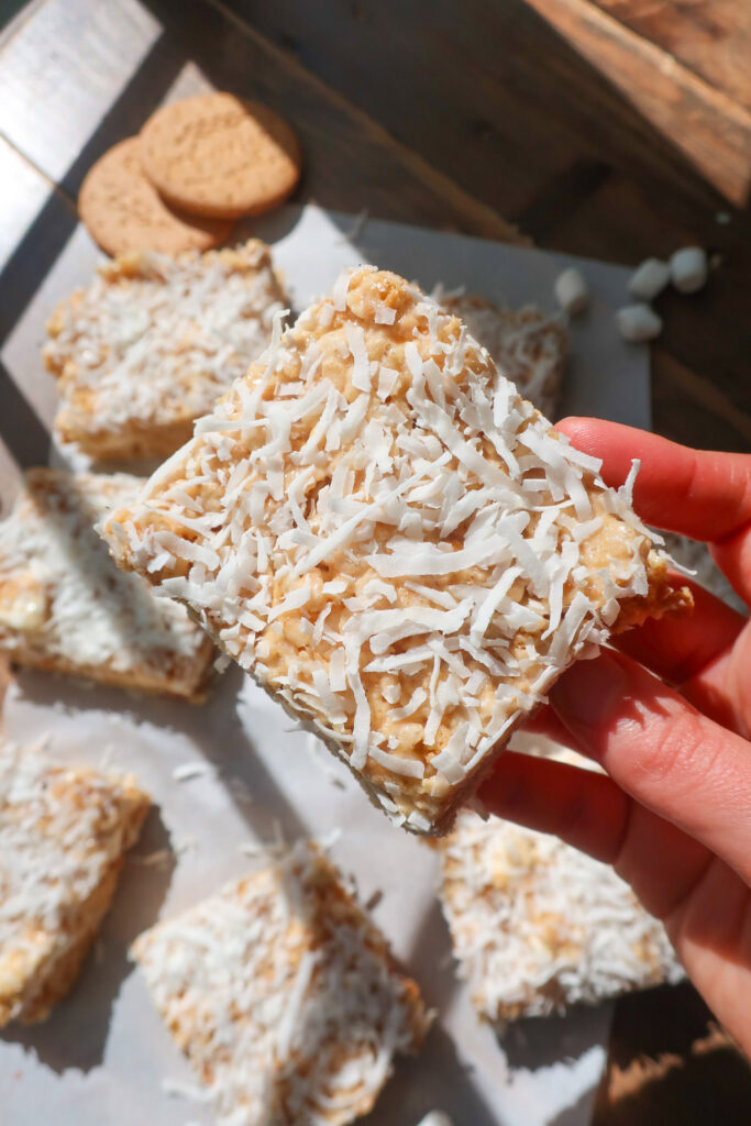 holding coconut rice krispie treat