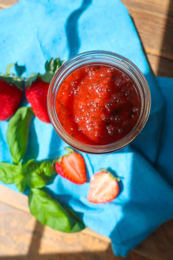 homemade strawberry sauce with fresh basil