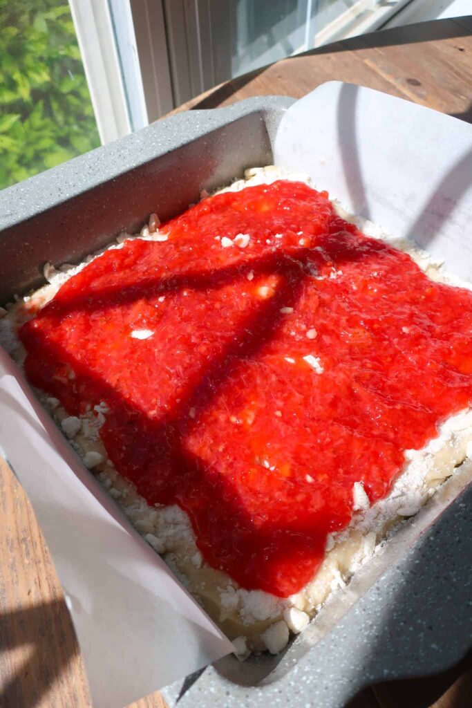 strawberry filling on top of coffee cake
