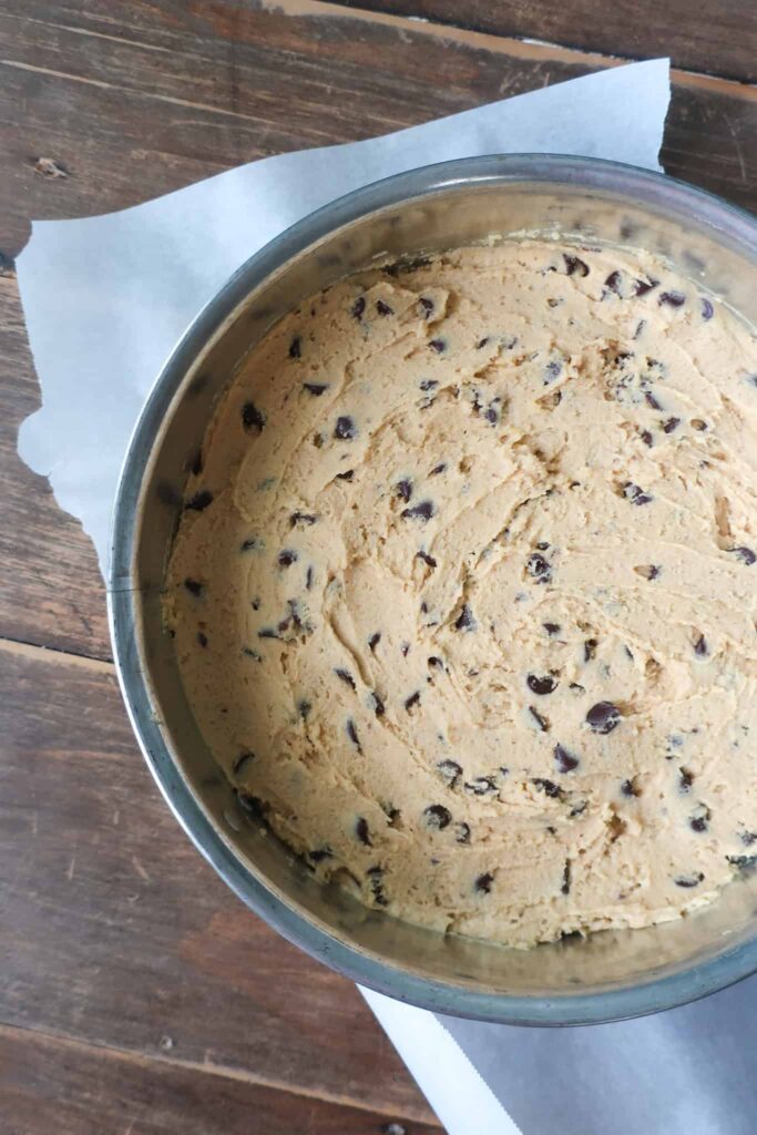 cookie dough in pan for cookie cake