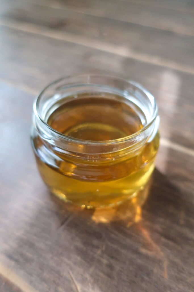 homemade rosemary simple syrup in jar