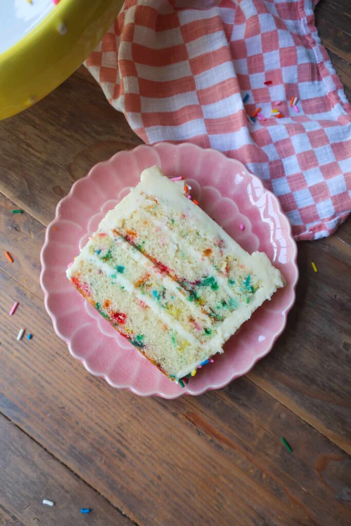 slice of mini vanilla cake with sprinkles